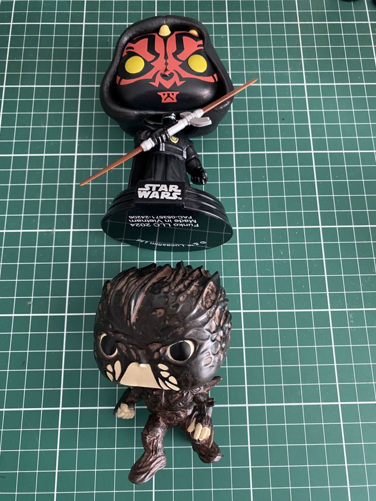 Darth Maul and Dark Flash Pop! vinyl figurines used to make a custom Sleep Token figurines