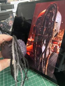 testing out the look against the original to make a custom Sleep Token figurine