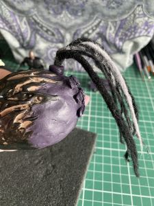 back view of dreads to make a custom Sleep Token figurine