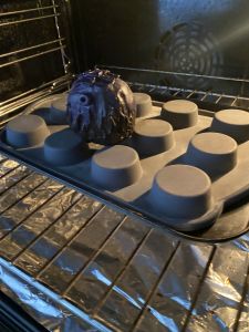 ii head in the oven to make a custom Sleep Token figurine