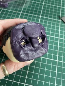 basic shapes for the sculpted mask on a custom Sleep Token figurine