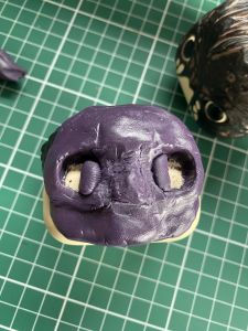 sculpture eye ajustment for a custom Sleep Token figurine
