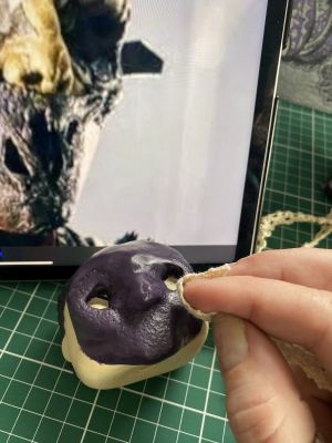 applying lace texture to a custom Sleep Token figurine