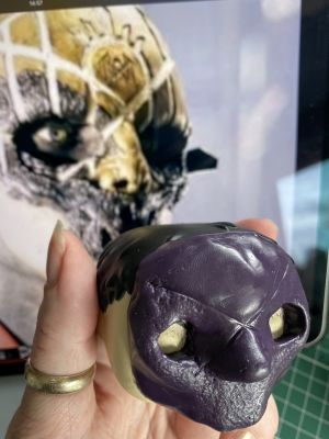 marking mask proportions on a custom Sleep Token figurine