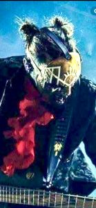 lightened photo of iii with spacebuns rocking on out on the bass