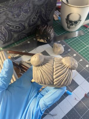 sculpting iii's hair on a custom Sleep Token figurine