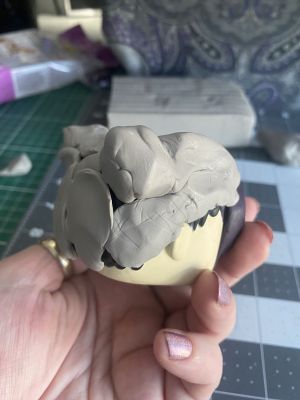 sculpting iii's hair on a custom Sleep Token figurine
