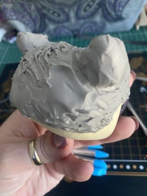 sculpting iii's hair on a custom Sleep Token figurine