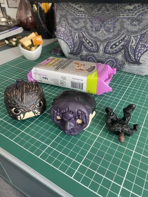 sculpting iii's hair on a custom Sleep Token figurine