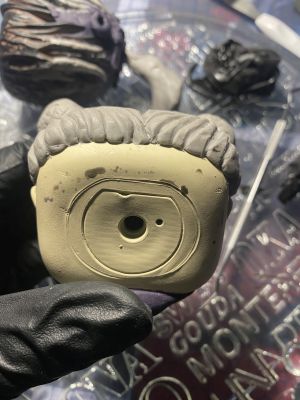 sculpting iii's hair on a custom Sleep Token figurine