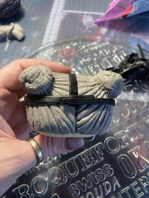 sculpting iii's hair on a custom Sleep Token figurine