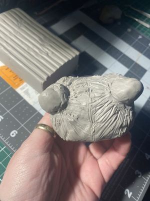 sculpting iii's hair on a custom Sleep Token figurine