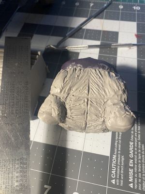 sculpting iii's hair on a custom Sleep Token figurine