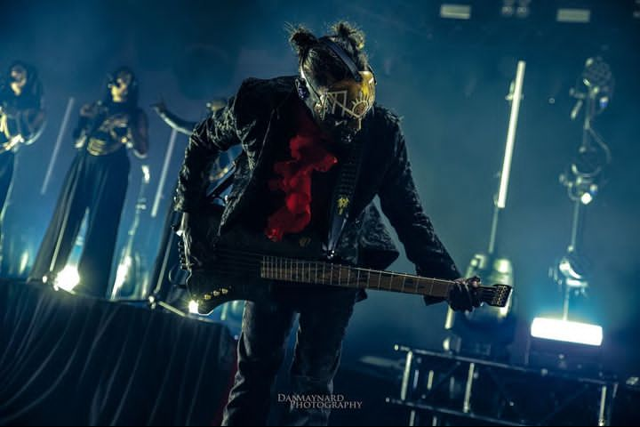 iii with spacebuns rocking out on stage