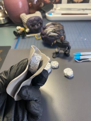 covering foil drum forms with clay for custom Sleep Token figurine
