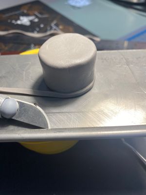 covering foil drum forms with clay for custom Sleep Token figurine