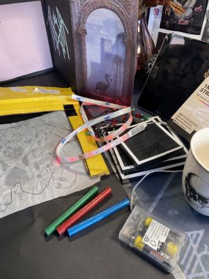 innards of a stage with glitter glue sticks